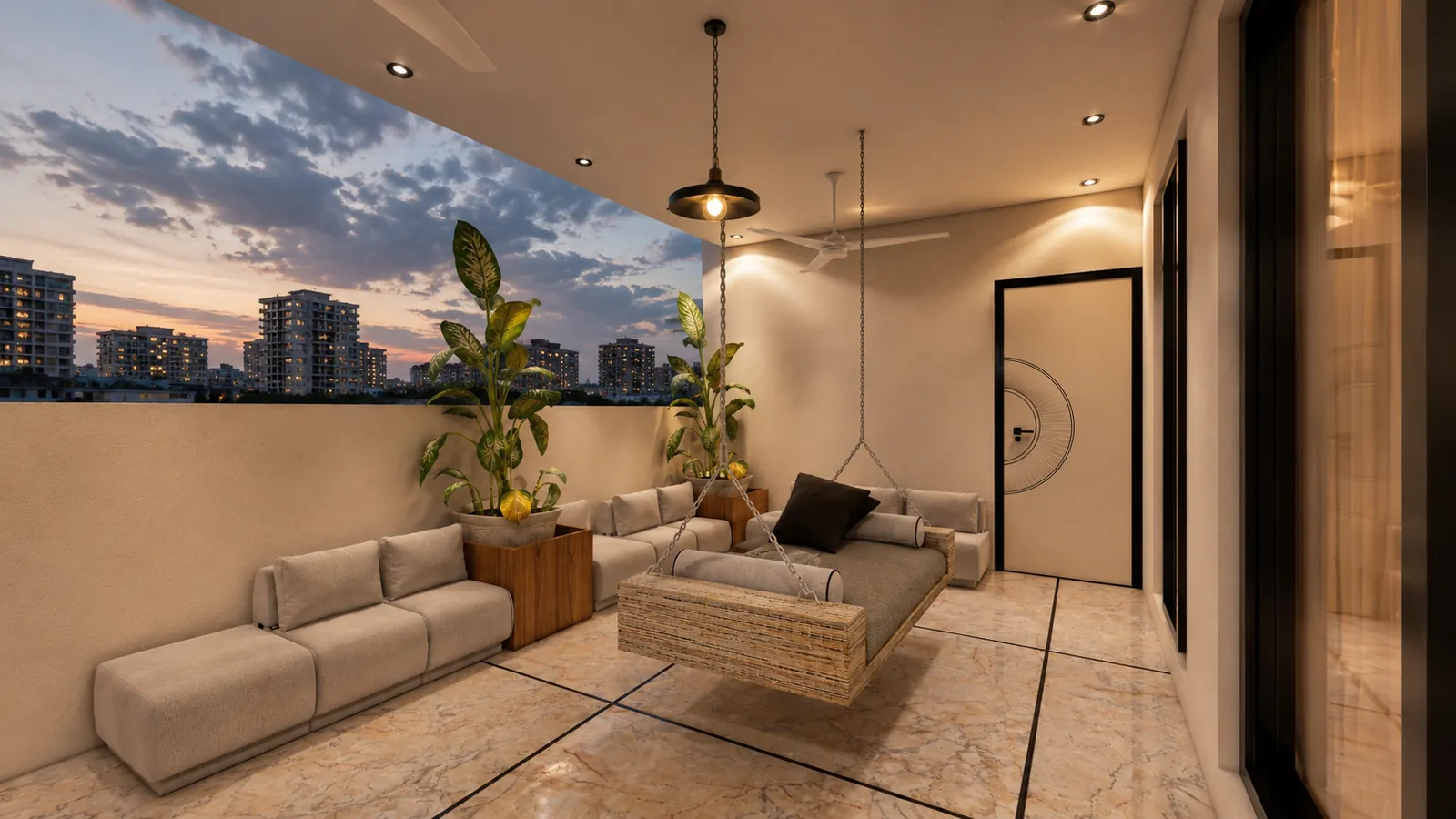A covered terrace sit-out with a hanging swing, built-in cream seating, potted plants, a pendant light and a city view at dusk